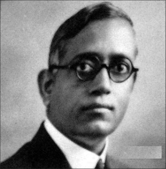 Verified historical portrait of Dr Ganapati Panja wearing glasses